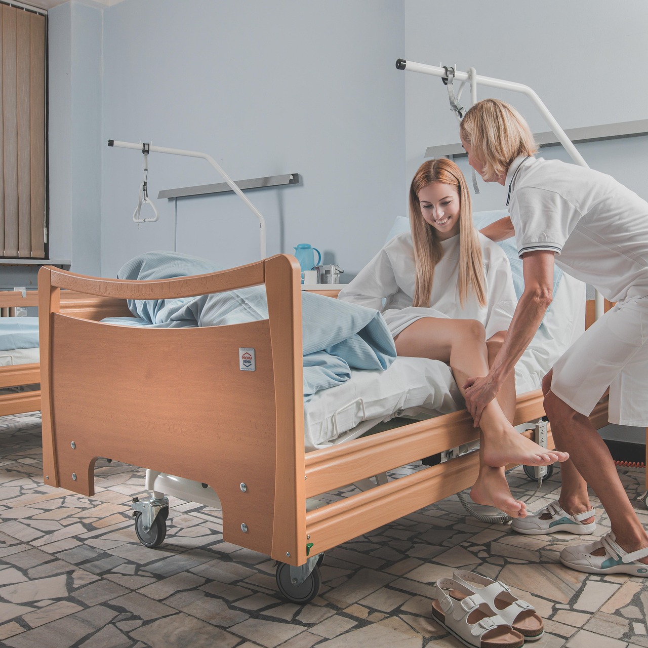 physiotherapist consulting patient in clinic